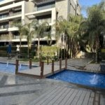 Swimming pool and landscaped gardens at El Patio 7 compound - حمام السباحة والحدائق في كمبوند الباتيو 7 - El Patio 7 New Cairo
