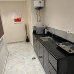 Studio kitchen with black cabinets - مطبخ الاستوديو بخزائن سوداء - equipped kitchen Southern Lotus