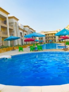Luxury chalet for sale in Red Carpet project, 90 sqm, Al Ain Al Sokhna, Suez
