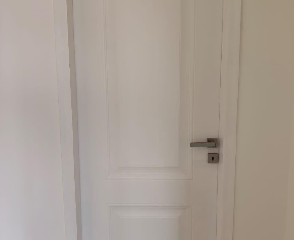 White panelled interior door in a hallway - apartment in Capital Gardens, New Cairo
