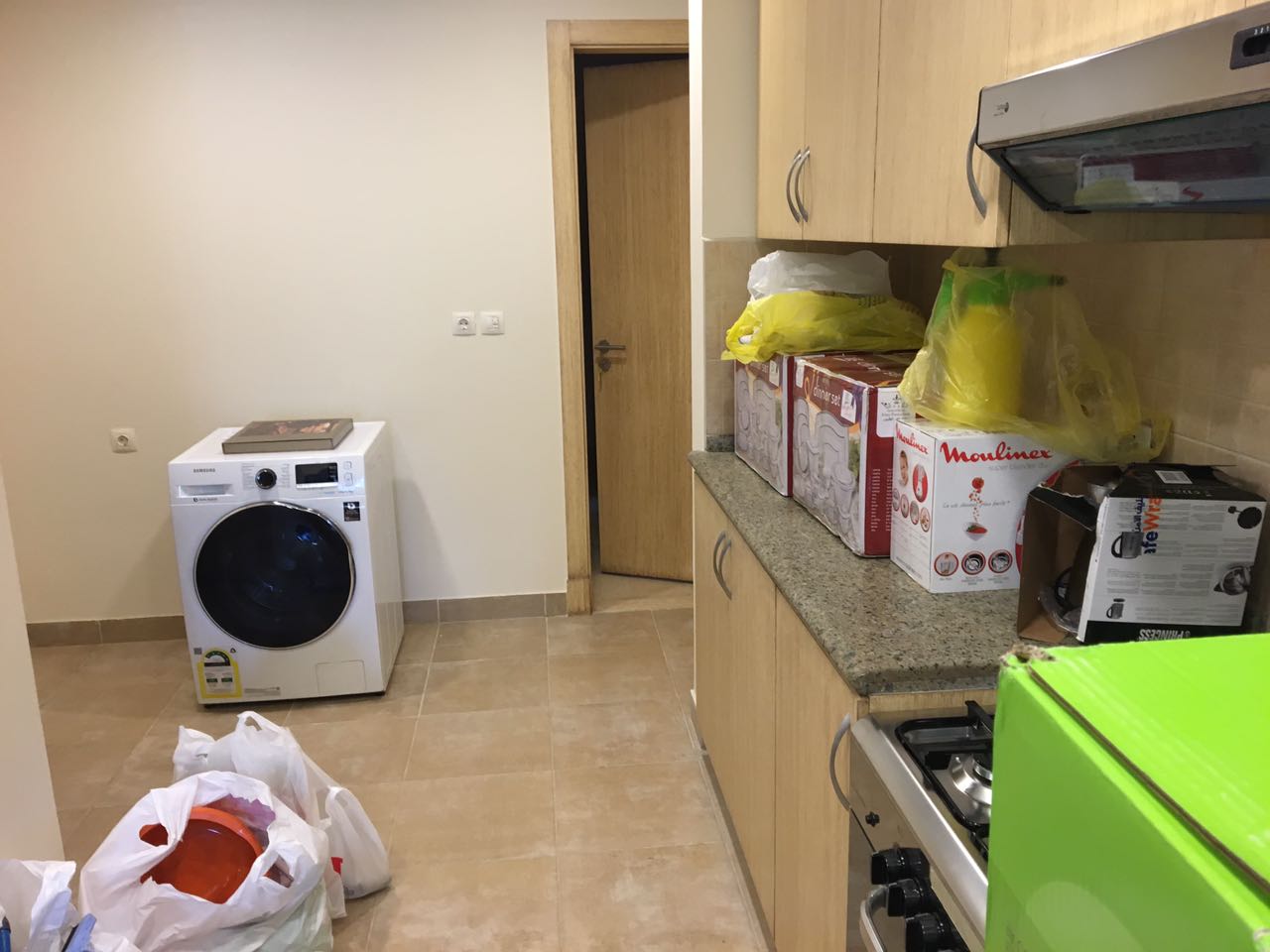 Laundry area with appliances and boxes - villa in Alba Alia, Mokattem