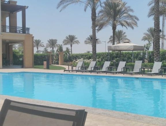 Apartment for sale in Alto Residence Uptown Cairo - compound pool view - شقة للبيع في ألتو ريزيدنس أب تاون كايرو - فيو حمام سباحة الكمبوند