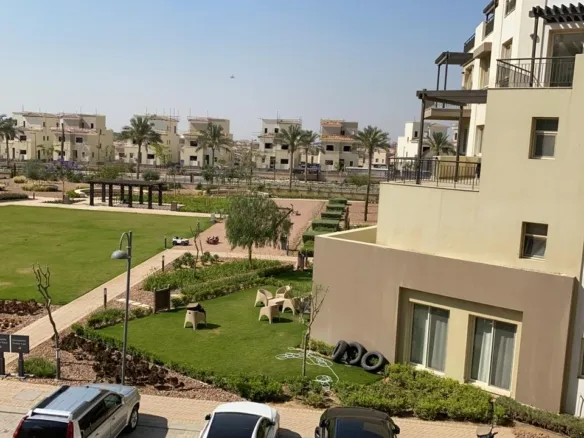 Apartment for sale in Sierras Uptown Cairo - compound gardens view - شقة للبيع في سييراز أب تاون كايرو - فيو جناين الكمبوند