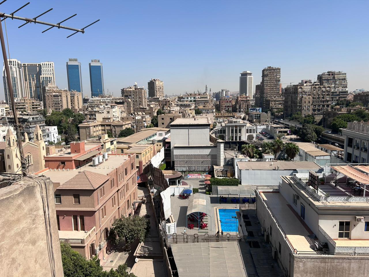 City view over rooftops toward twin towers - shop in Zamalek