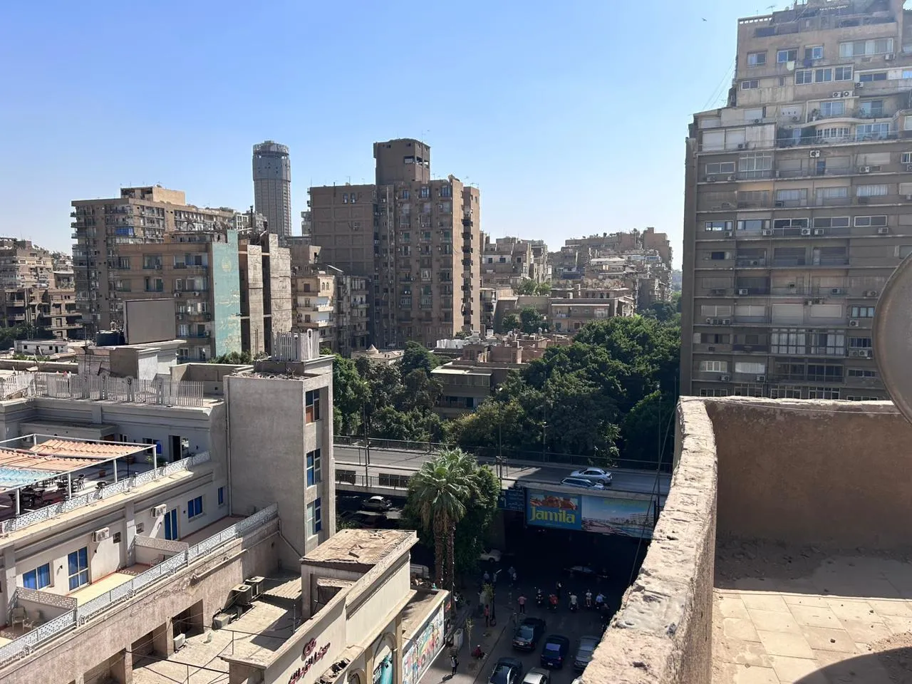 Rooftop parapet overlooking city streets - shop in Zamalek