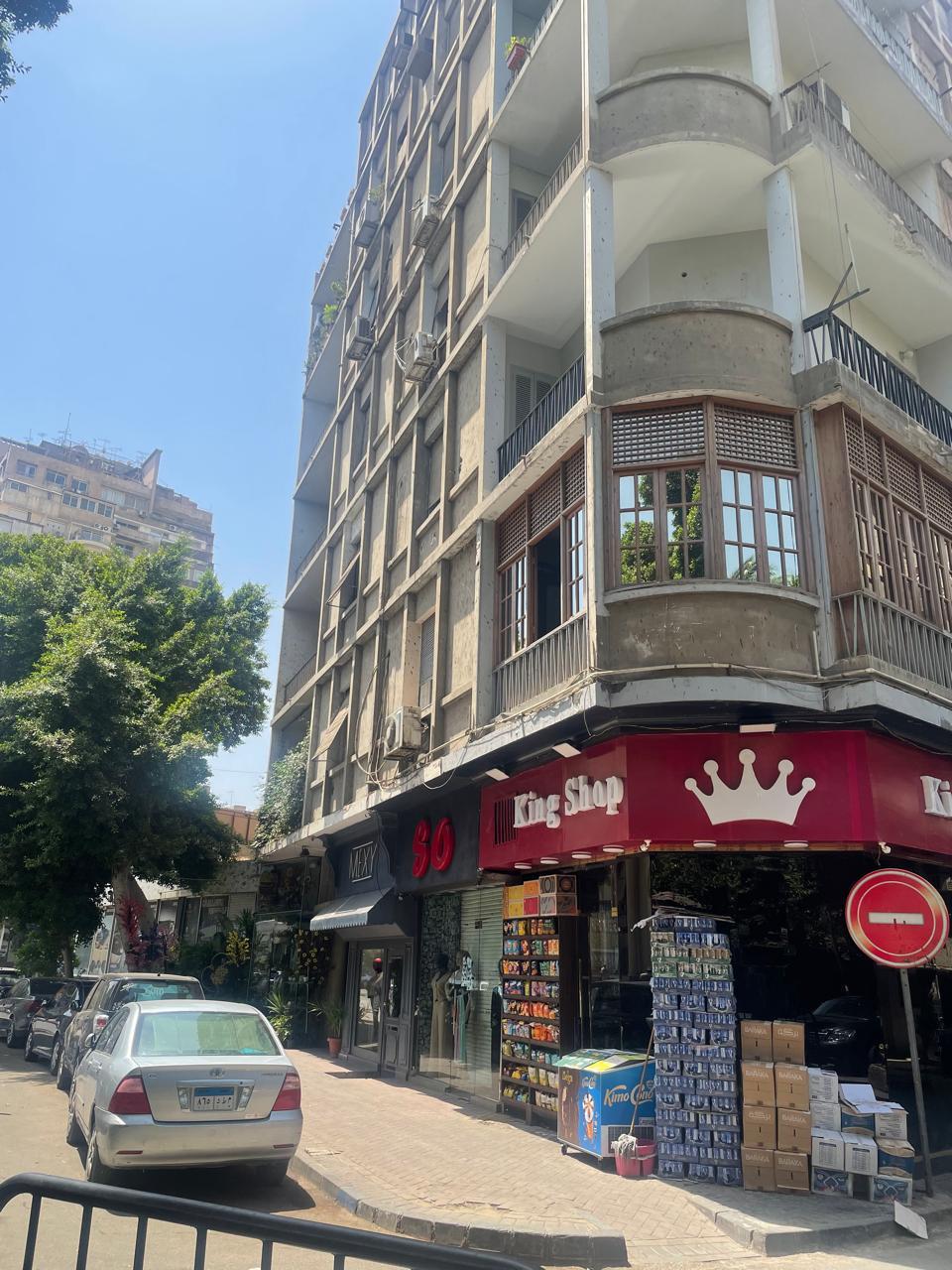 Corner building with shops on a sunny street - shop in Zamalek