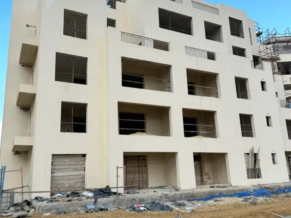 O West apartment building exterior in 6th of October - واجهة مبنى شقق في أو ويست 6 أكتوبر