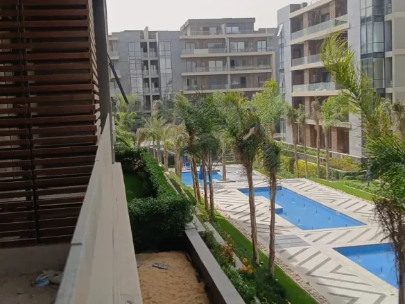 Pool view from apartment balcony in El Patio Ora - إطلالة حمام السباحة من بلكونة شقة في الباتيو أورا