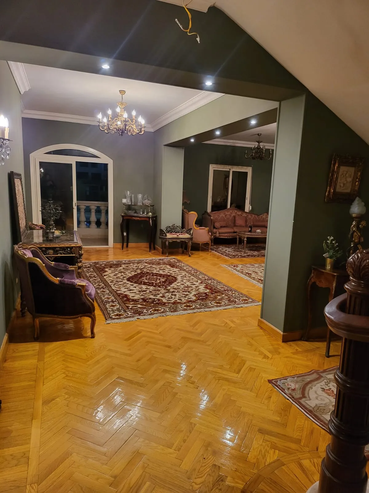 property-image-69efec78d8f79 منظر ريسبشن من خلال قوس بأرضية باركيه - دوبلكس في البنفسج، القاهرة الجديدة