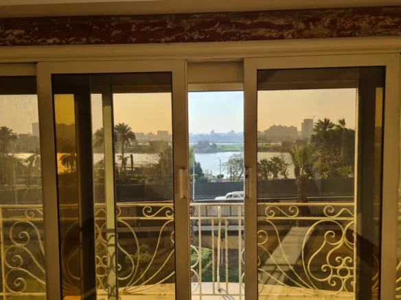 Direct Nile view from terrace doors, Cornish El Nile Maadi apartment - فيو النيل مباشر من أبواب التراس، شقة كورنيش النيل المعادي - Nile view apartment for sale Maadi
