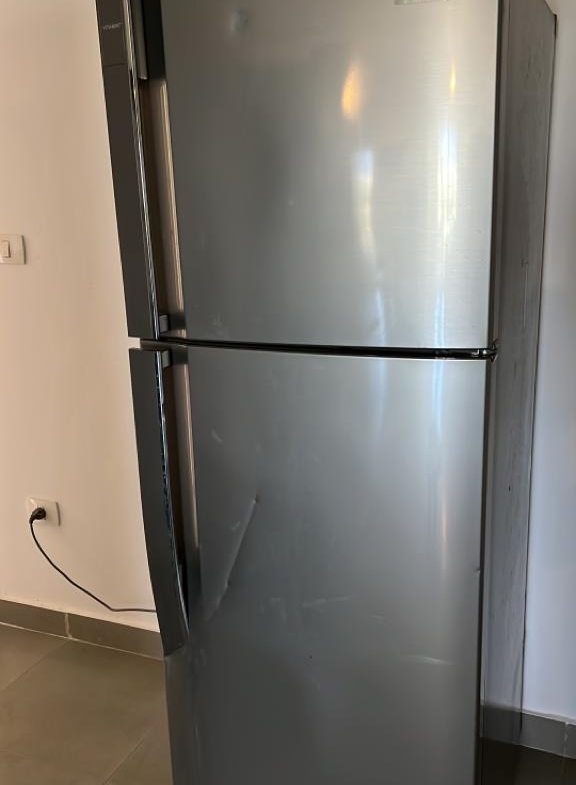Stainless steel fridge by the wall - chalet in Amwaj, North Coast