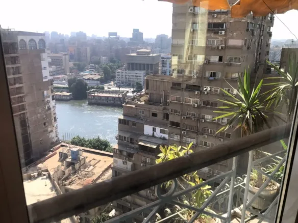 شقة للبيع في الزمالك القاهرة | فيو جزئي على النيل، 4 غرف، 300م²