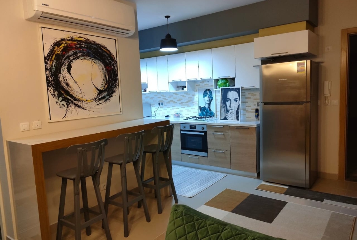 Kitchen bar with stools and stainless fridge - chalet in Marassi Marina 1, North Coast