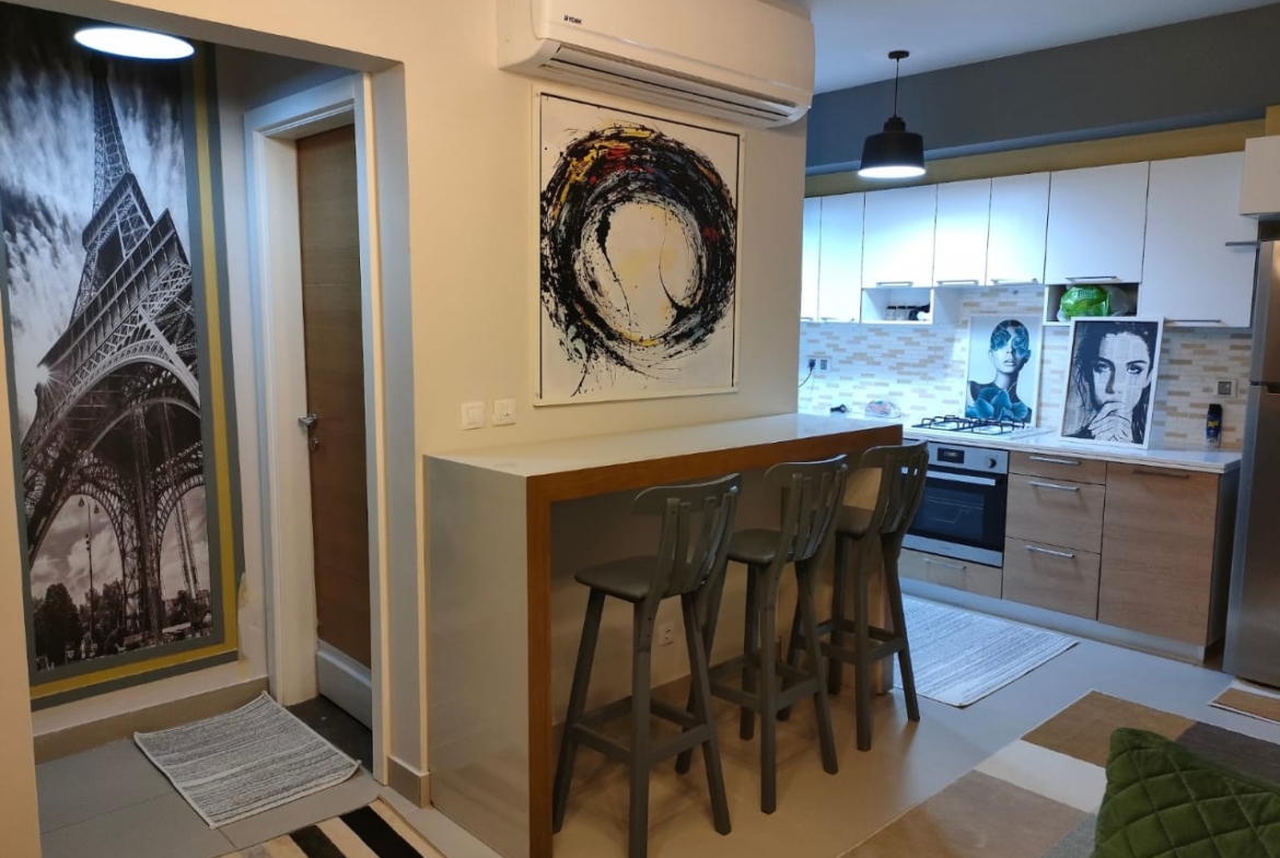 Entrance with Paris poster and kitchen bar - chalet in Marassi Marina 1, North Coast