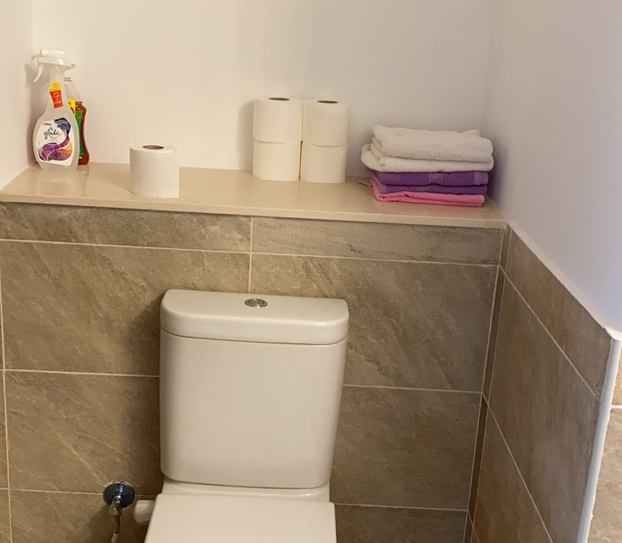 Bathroom with toilet and beige tiles - chalet in Marassi Marina Residence, North Coast