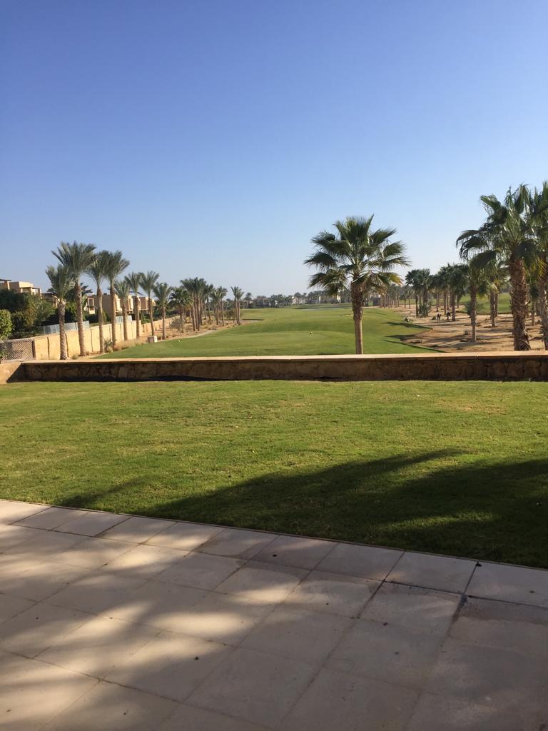 property-image-69f0b6f34ad6a Covered terrace beside a broad green lawn - villa in Little Venice, Ain Sokhna