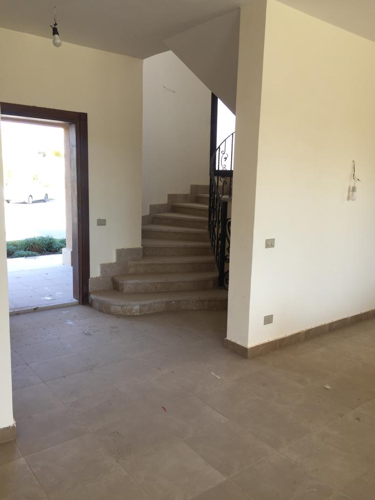 property-image-69f0b6f51ac6a Empty entrance hall beside the stairs - villa in Little Venice, Ain Sokhna
