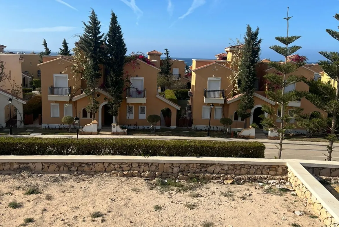 Sandy plot with townhouses behind - villa in Diplomats, North Coast