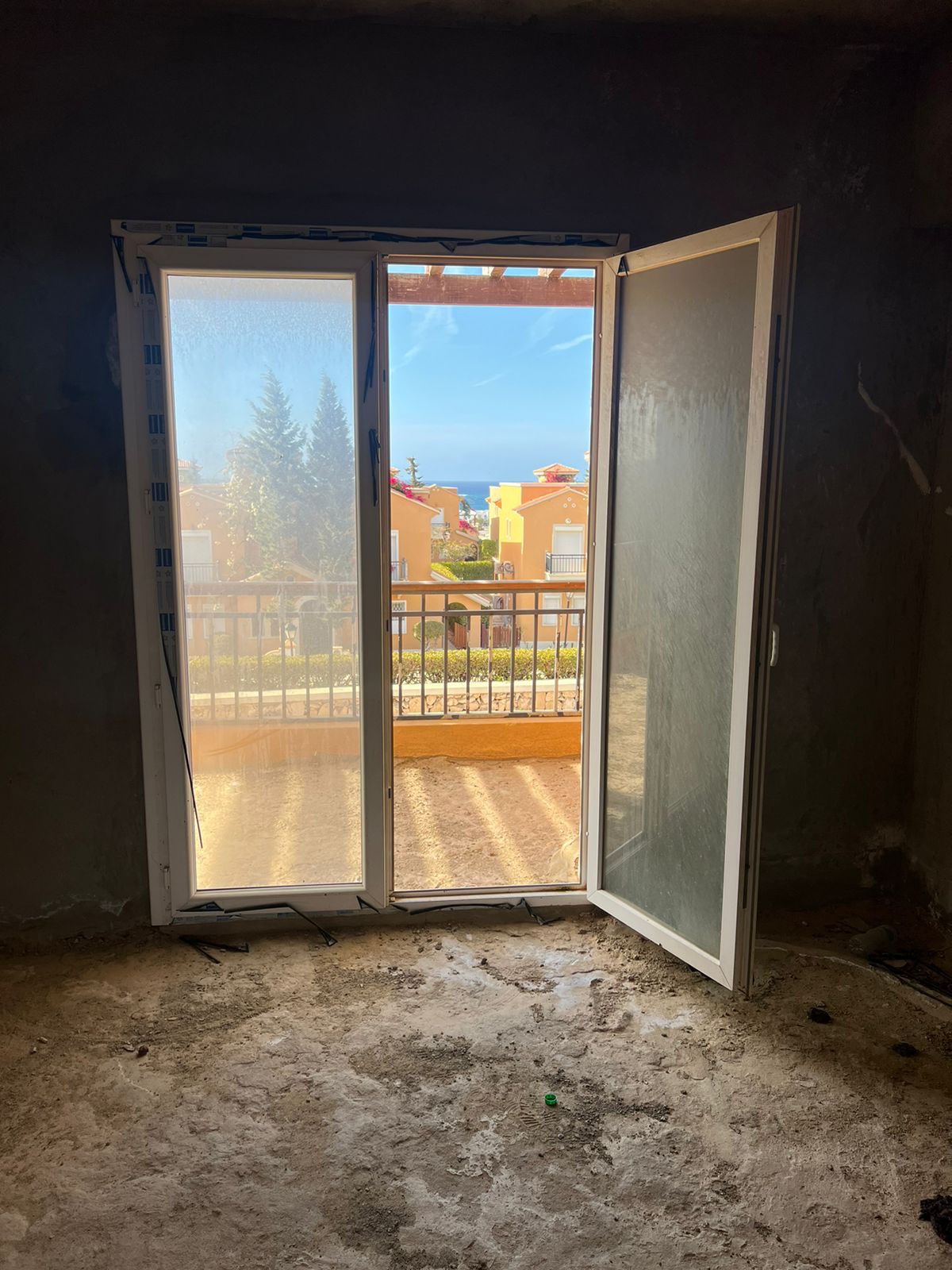 Balcony glass doors in an unfinished room - villa in Diplomats, North Coast