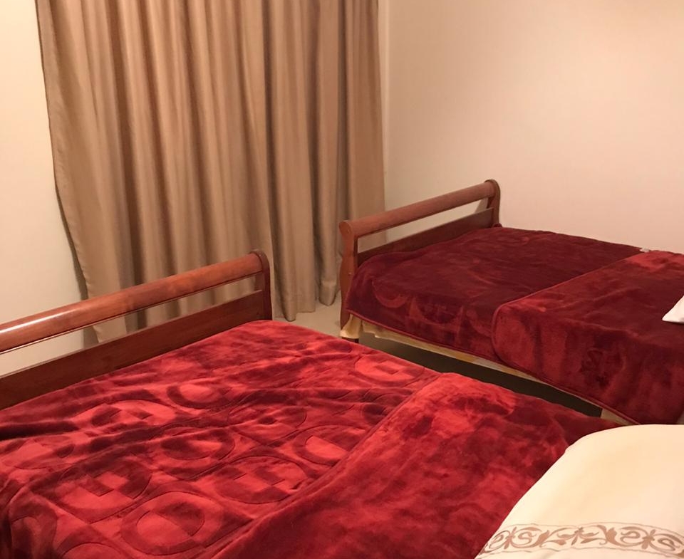 Bedroom with two beds and red covers - twinhouse in La Vista 4, Ain Sokhna