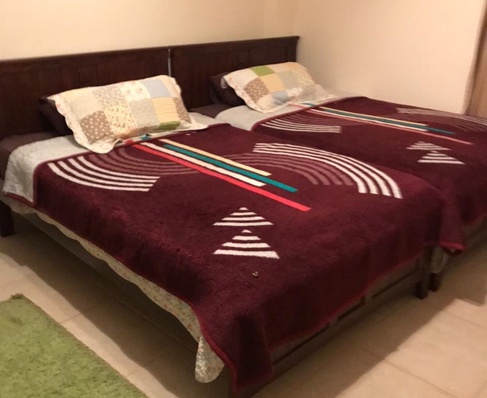 Double bed with burgundy cover - twinhouse in La Vista 4, Ain Sokhna