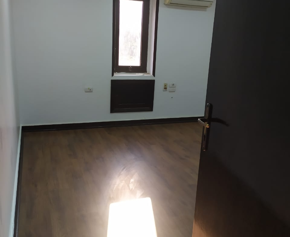 Empty room with a dark wardrobe wall - apartment in Zamalek