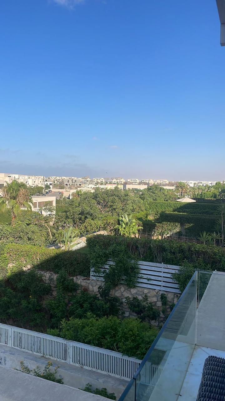property-image-69f0d9b055e8a قمم أشجار وخضرة من الدور العلوي - شاليه في هاسيندا باي، الساحل الشمالي