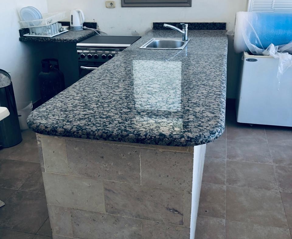 Open kitchen with stone counter - villa in Little Venice, Ain Sokhna