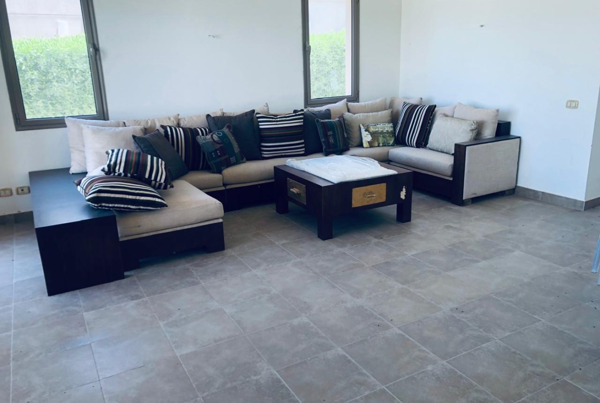Living room beside large windows - villa in Little Venice, Ain Sokhna