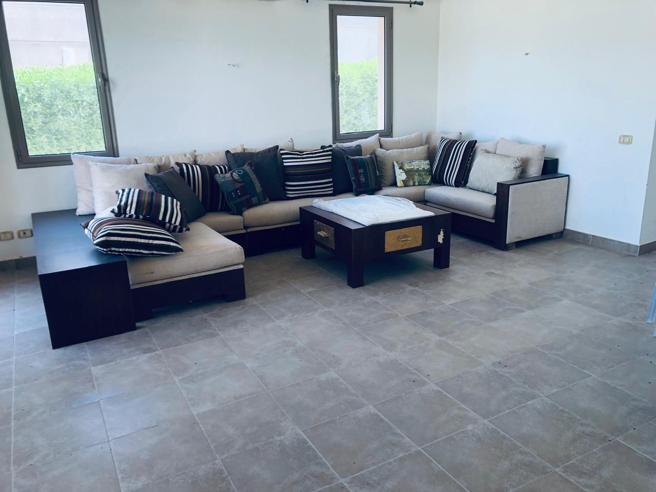 Living room beside large windows - villa in Little Venice, Ain Sokhna