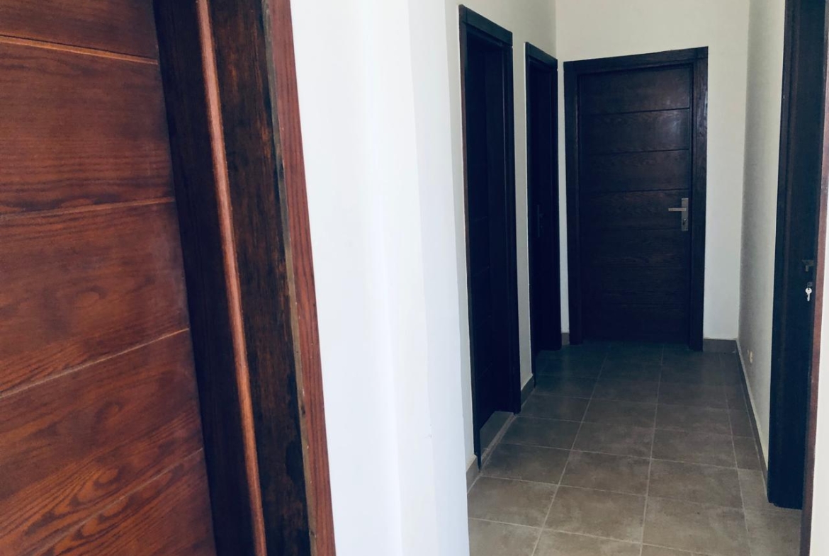 Hallway with wooden doors - villa in Little Venice, Ain Sokhna