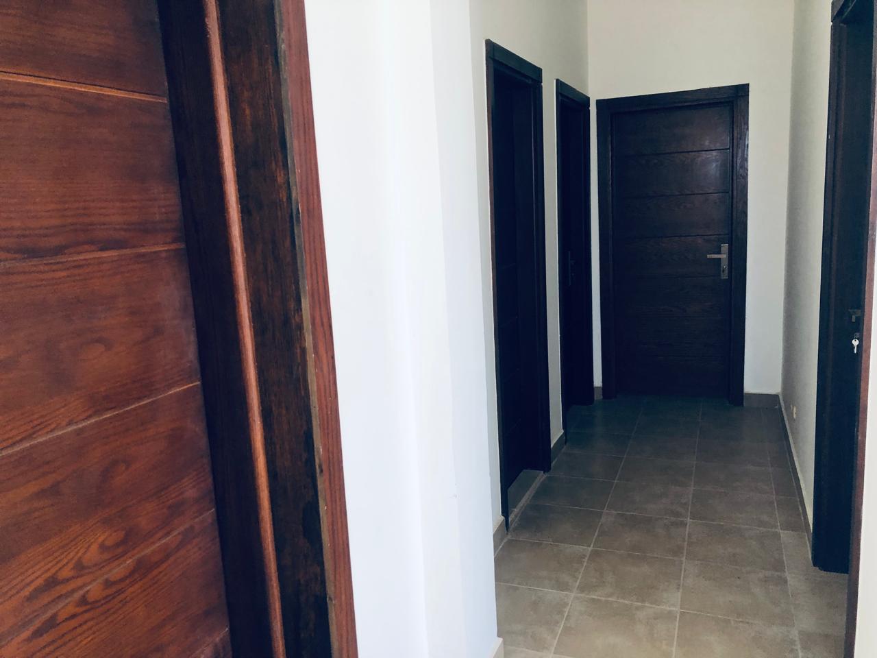 Hallway with wooden doors - villa in Little Venice, Ain Sokhna