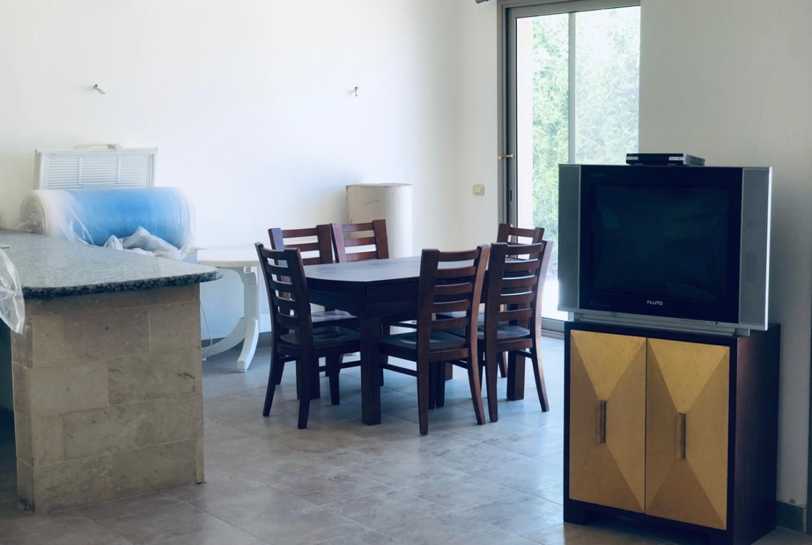 Dining table beside the kitchen counter - villa in Little Venice, Ain Sokhna