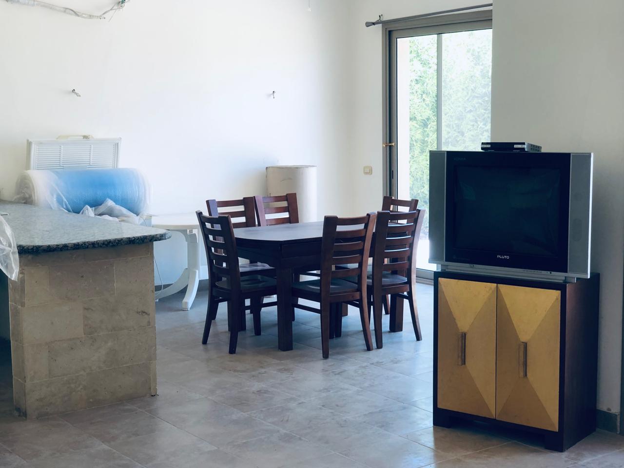 Dining table beside the kitchen counter - villa in Little Venice, Ain Sokhna