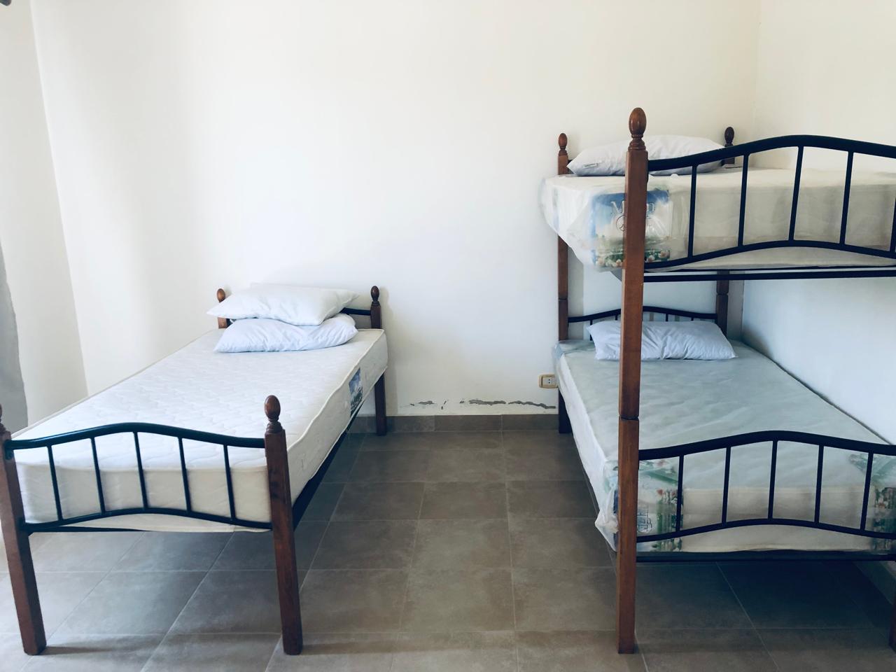 Bedroom with single and bunk beds - villa in Little Venice, Ain Sokhna