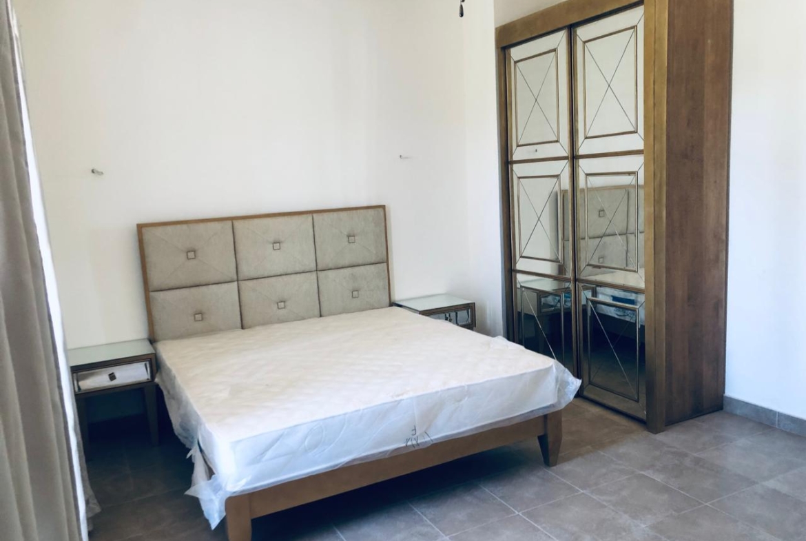 Bedroom with double bed and wardrobe - villa in Little Venice, Ain Sokhna