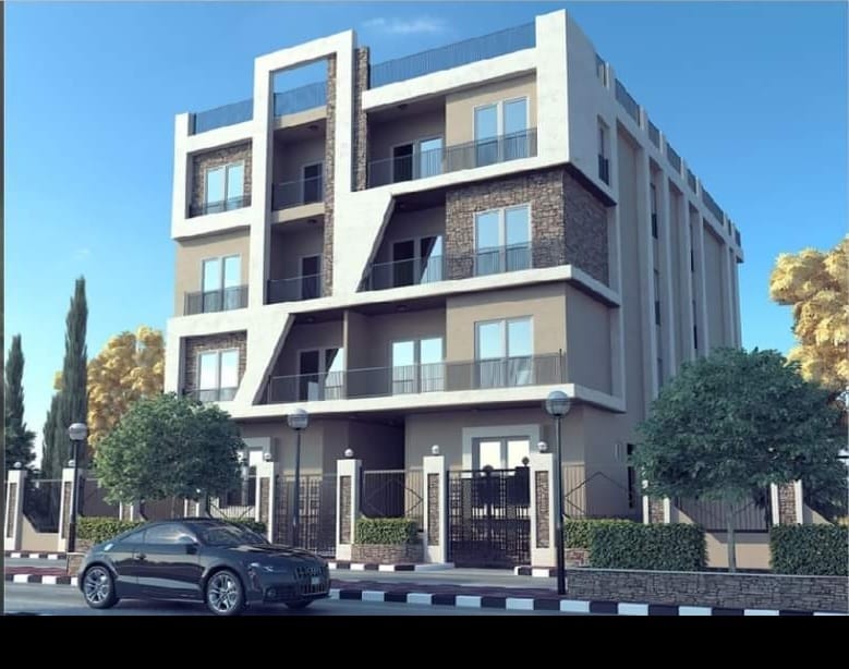 Modern apartment building with a dark and white facade and glass balconies - apartment in Bayt Al Watan, New Cairo