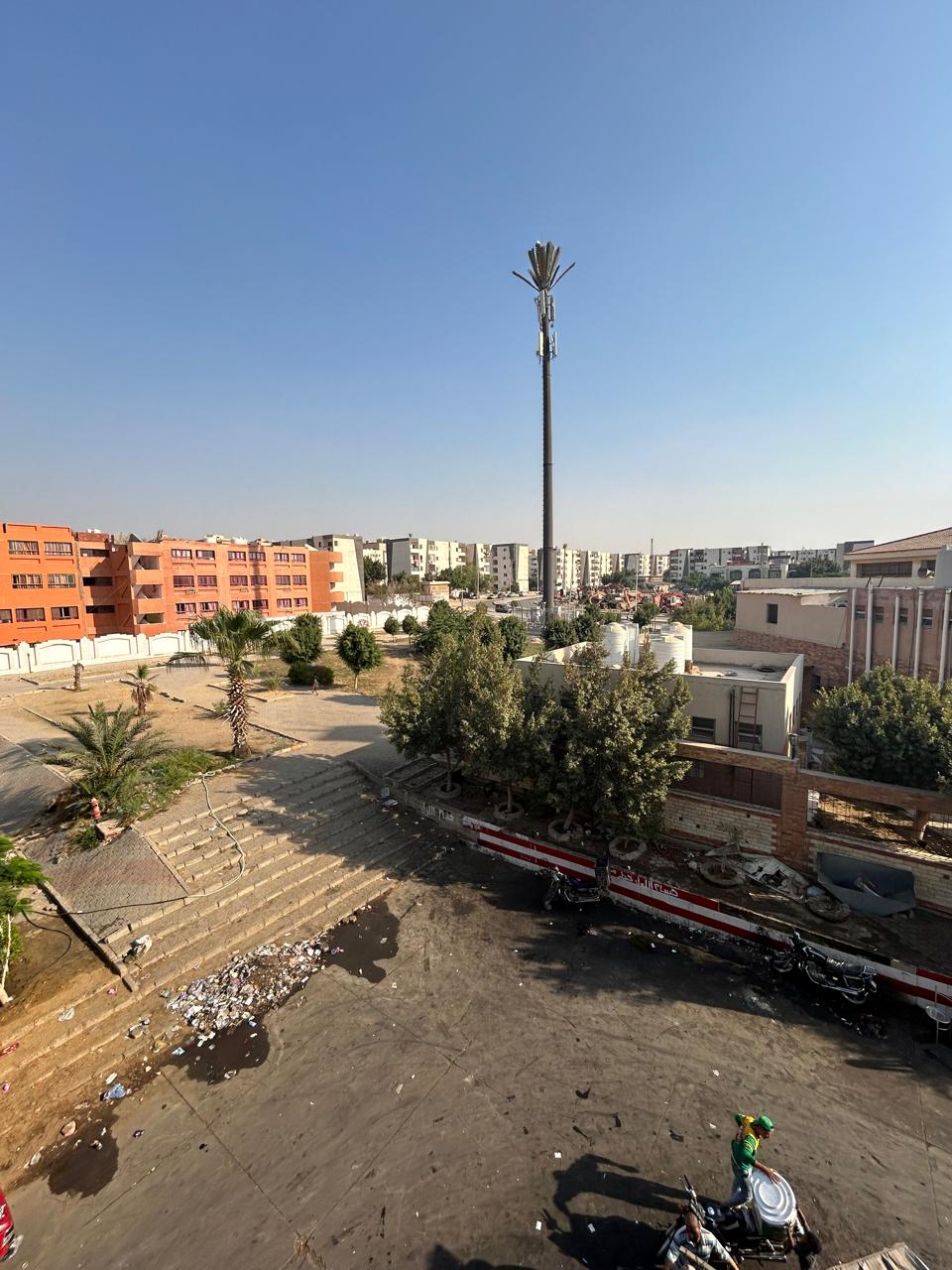 property-image-69f12e0fa946c View over a plaza and a tall mast from above - unit in 5th Settlement, New Cairo