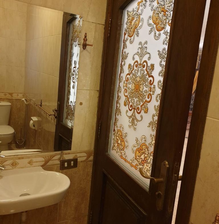 Bathroom with a decorative glass door - villa in Maadi Heights