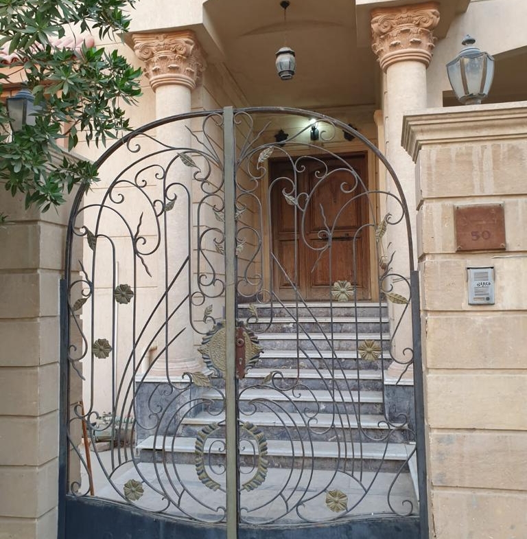 Wrought-iron gate at a villa entrance - villa in Maadi Heights
