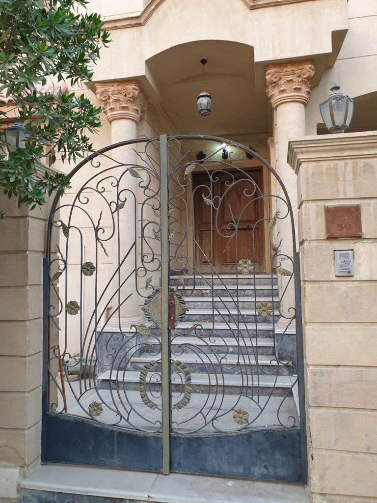 Wrought-iron gate at a villa entrance - villa in Maadi Heights