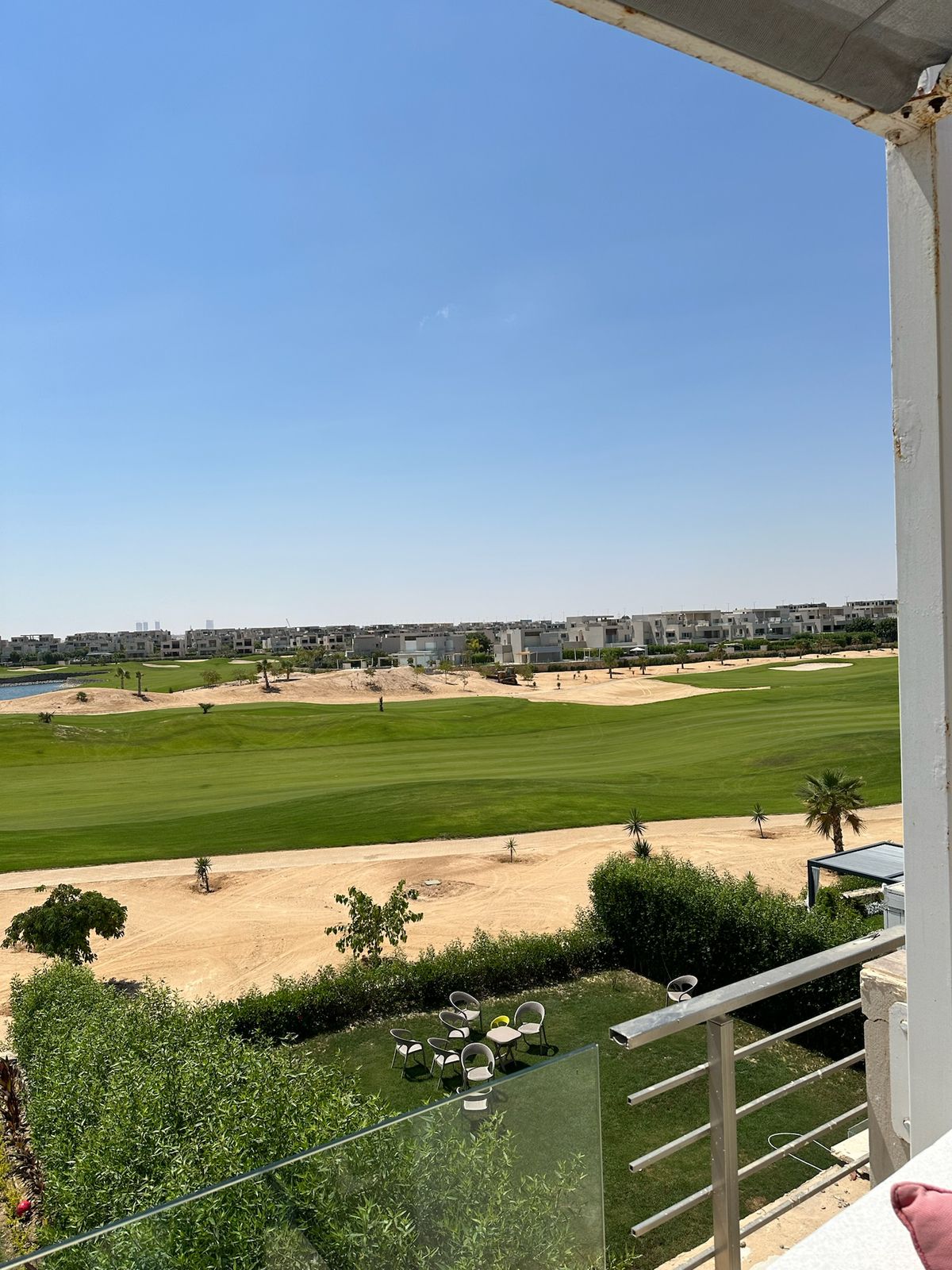 Balcony railing overlooking the golf course - chalet in Hacienda Bay, North Coast