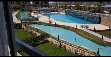 Pool view in Ain Bay village - فيو حمام سباحة في قرية عين باي - عين باي