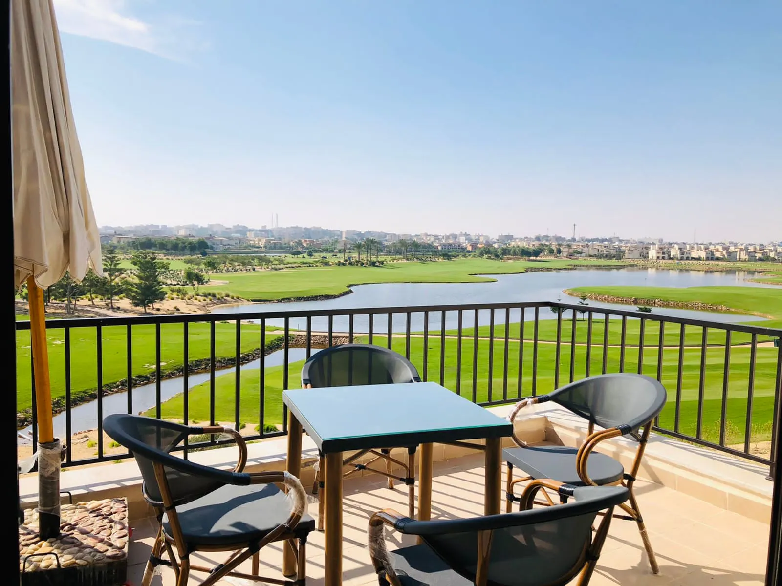 1-own-01-1247-source-01 Balcony with table and chairs overlooking the golf course - penthouse in Marassi Blanca, North Coast