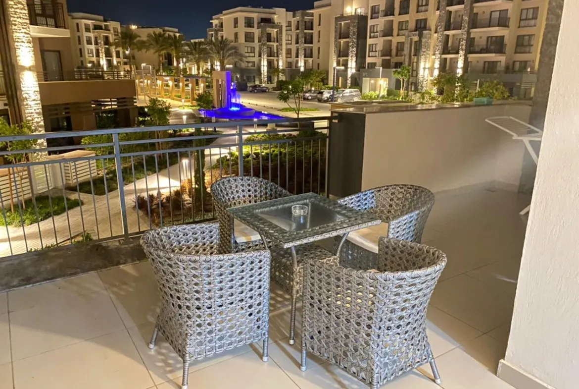 Balcony night view - 3BR chalet for sale in Marassi, North Coast | إطلالة البلكونة ليلاً - شاليه 3 غرف للبيع في مراسي الساحل الشمالي