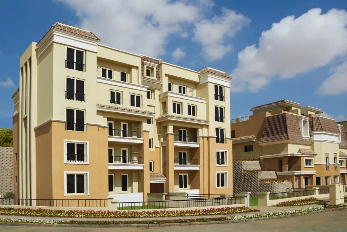عمارة سكنية صفراء بجوار فيلا بكسوة حجر - فيلا في سراي مدينة المستقبل