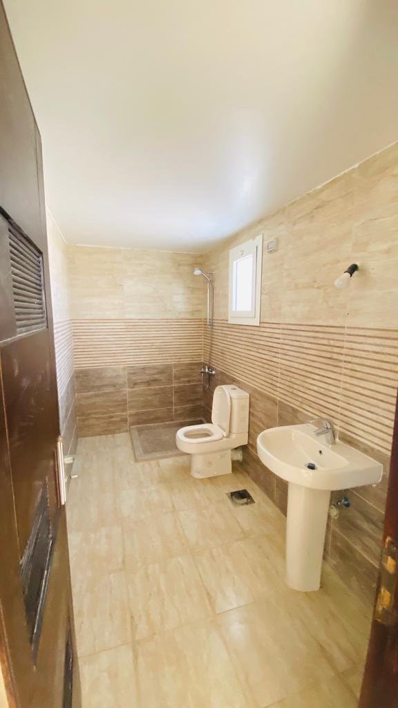 3-bedroom-chalet-for-sale-in-egypt-4 Bathroom with sink and toilet in a chalet at Aroma Resort
