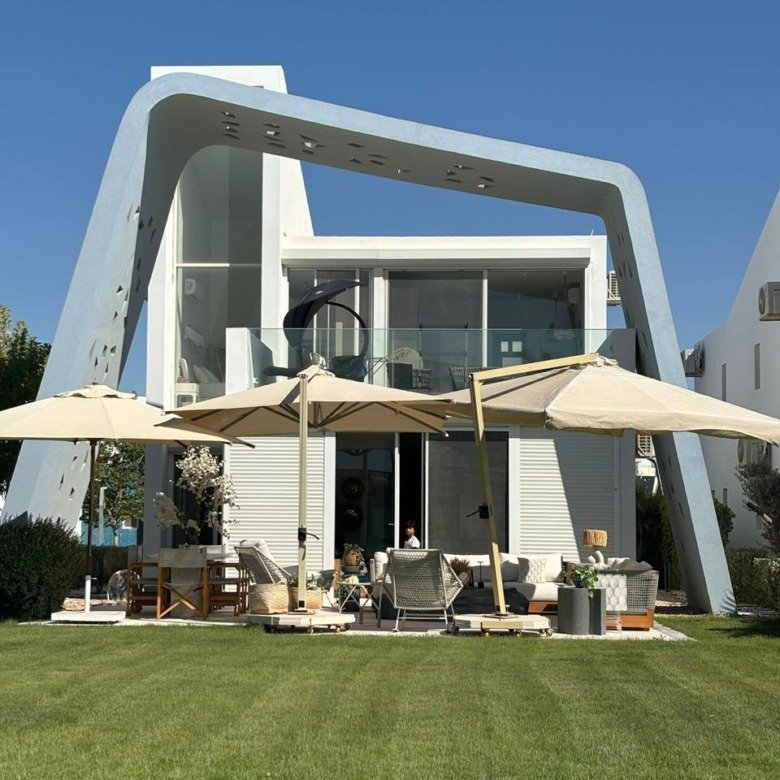 Fouka Bay villa exterior and garden in the compound - واجهة فيلا وجاردن في كمبوند فوكا باي