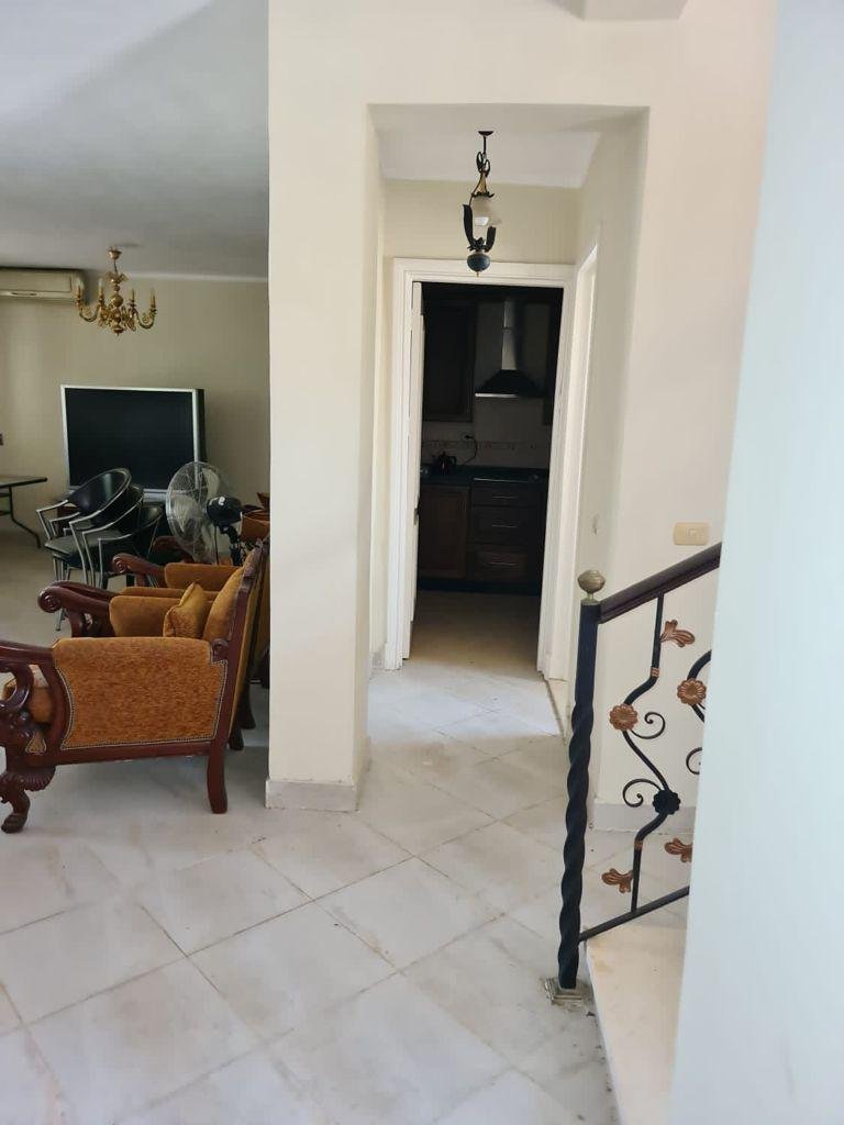 Hallway and sitting area in a villa for sale in Stella Heliopolis
