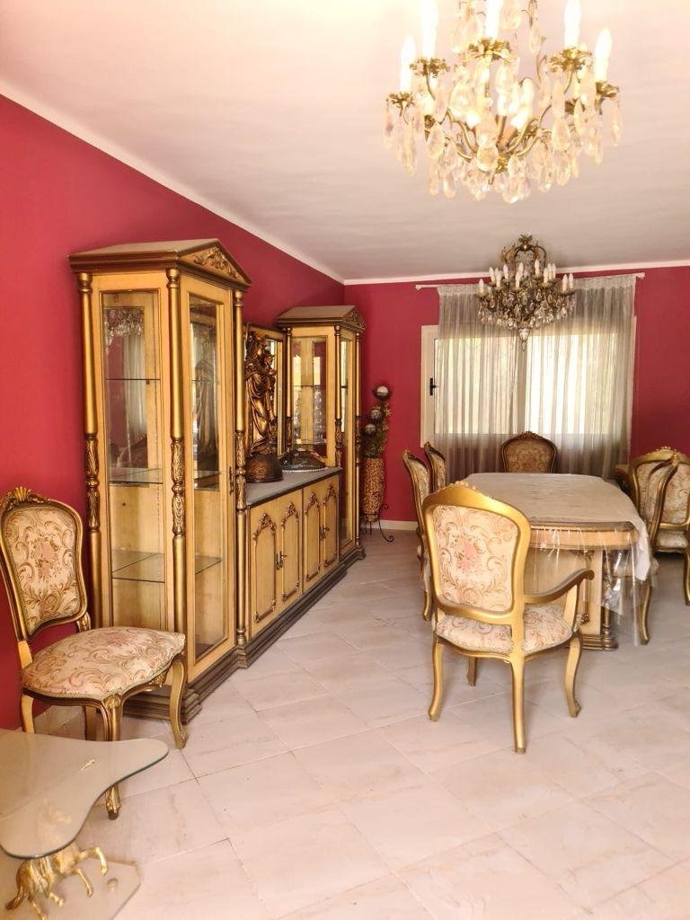 Dining room in a villa for sale in Stella Heliopolis